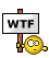 1968 Ford Mustang - A sign displaying 'WTF' is held by a confused smiley face emoji.