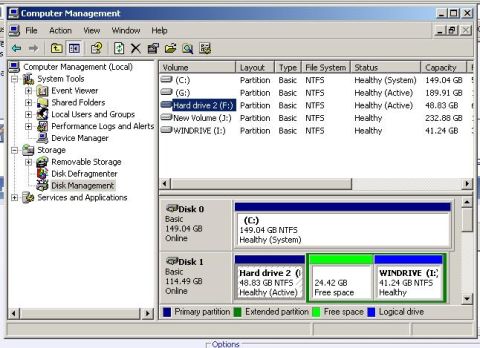 1992 Ford Probe - This screenshot displays the Disk Management utility, detailing hard drive partitions and their status.