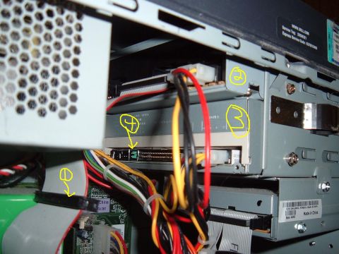 1979 Ford Bronco - Close-up view of internal computer components, including wiring and drive bays, with numbered annotations.