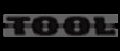 1991 Ford Bronco - This image shows the word TOOL on a gray background.