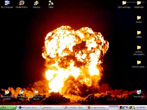 1991 Ford LTD Crown Victoria - Desktop wallpaper displays a mushroom cloud from a nuclear detonation, with computer icons and taskbar elements.