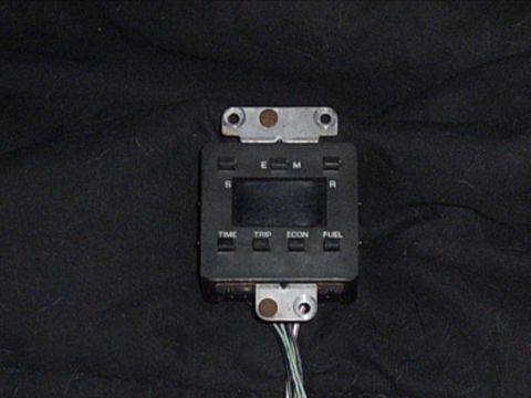 1991 Ford LTD Crown Victoria - This digital display unit shows various functions like time, trip, economy, and fuel levels.