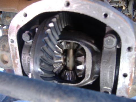 2004 Jeep Wrangler - Differential gears are visible within the housing of a vehicle's drivetrain.