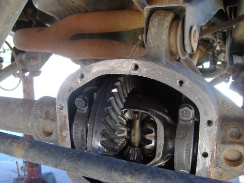 2004 Jeep Wrangler - Close-up view of a vehicle's differential, revealing the intricate gear mechanism within the housing.