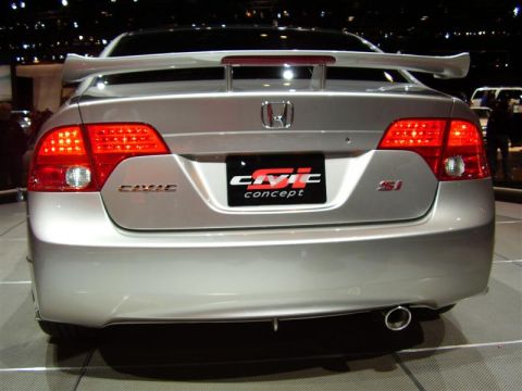 1997 Ford Taurus - Rear view of a silver Honda Civic Si Concept sedan with a prominent spoiler and distinctive taillights.