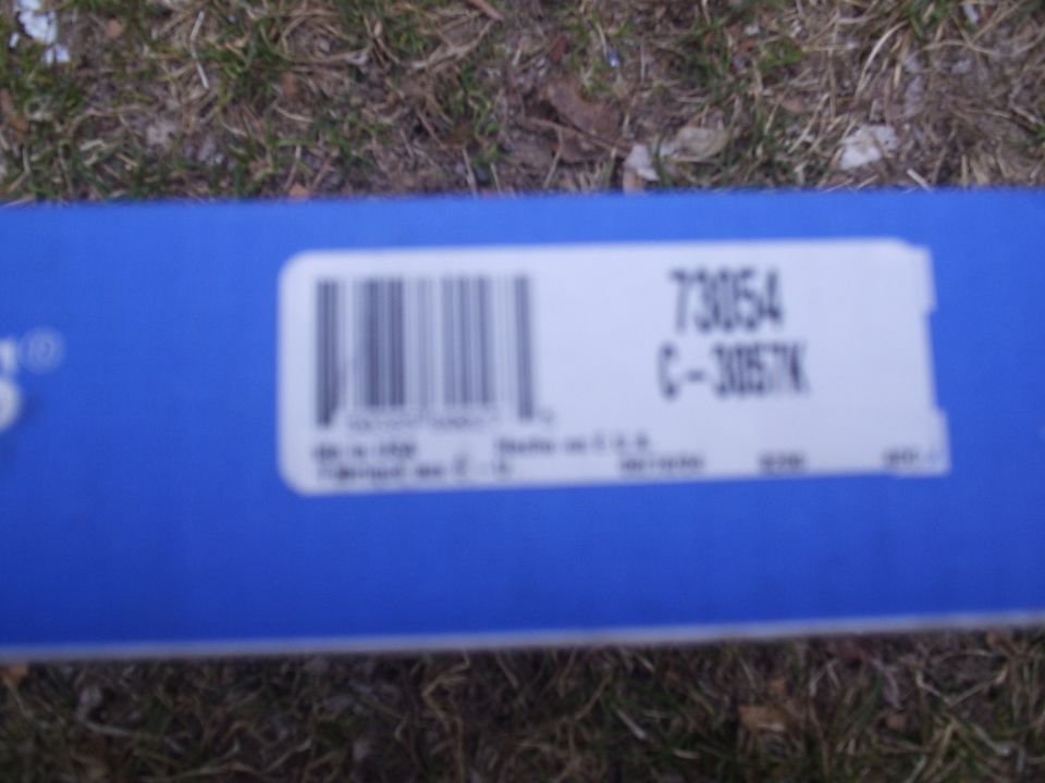 Blue auto-parts box label showing part numbers 73054 and C-3057K