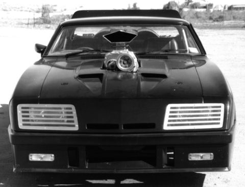 1972 Ford Ranchero - Front view of a modified 1972 Ford Ranchero, a large supercharger protruding from the hood.