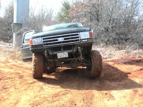 1991 Ford Bronco - This lifted Ford truck appears to be from the late 1980s, not a 1991 model.