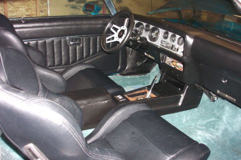 1979 Pontiac Trans Am - Interior view of a 1979 Pontiac Trans Am, black seats and a detailed dashboard.