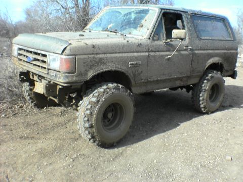1991 Ford Bronco - This heavily muddied 1991 Ford Bronco appears to be equipped for off-road adventures.
