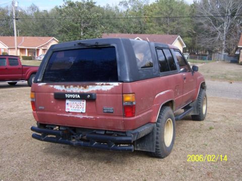 1984 Toyota 4Runner - This 1984 Toyota 4Runner is seen from the rear, showing its distinctive body style and aftermarket modifications.
