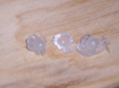 1993 Ford Probe - Three clear plastic pieces are shown on a wood-grain surface, with a Supermotors.net logo visible.