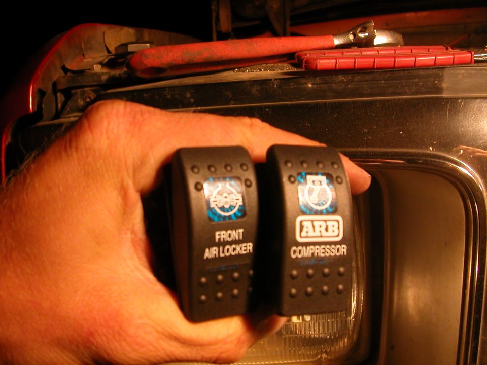 Two ARB switches, one labeled 'FRONT AIR LOCKER' and the other 'COMPRESSOR'