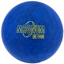 1985 Ford Bronco - A close-up of a blue bowling ball with swirling patterns and text indicating its brand and material.