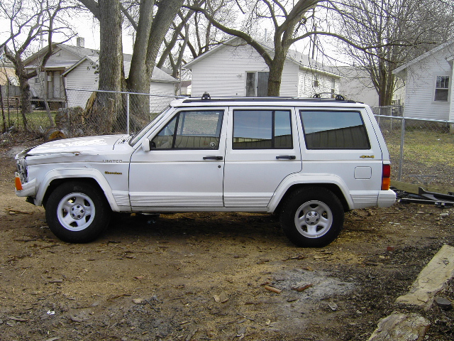White 1992 Jeep Cherokee side view with 'Limited' badge