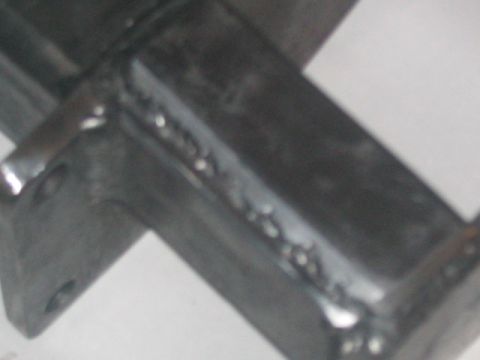 1991 Ford Bronco - This is a close-up view of a welded metal bracket, showing the weld seams.