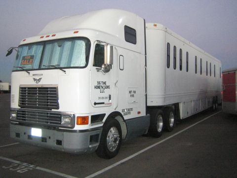 1968 Ford Mustang - A large white tractor-trailer, likely a horse van, is parked in a lot. It has multiple windows along its side and a "For Sale" sign in the…