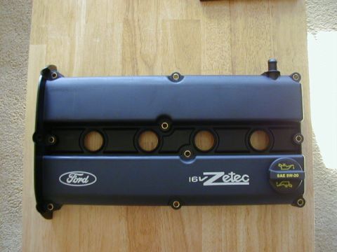 1994 Ford Probe - A Ford Zetec 16V engine valve cover is shown, the Ford logo and oil specifications.