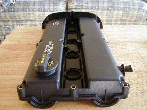 1994 Ford Probe - Ford Zetec 16V engine valve cover with oil cap indicating SAE 5W-20.