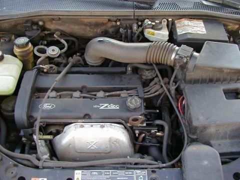1994 Ford Probe - Close-up view of a Ford 1.8L Zetec engine, showing the air intake system and engine components.