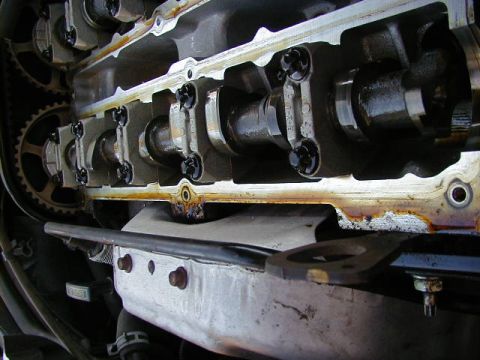 1994 Ford Probe - The engine's valve cover has been removed, exposing the camshafts and valve train components.