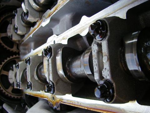 1994 Ford Probe - Close-up view of an engine's camshaft assembly, revealing internal mechanical components.