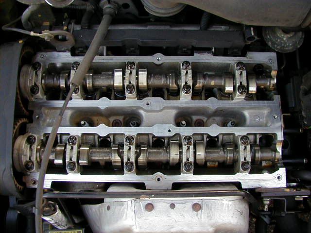 Close-up of an engine's overhead camshafts and valve train