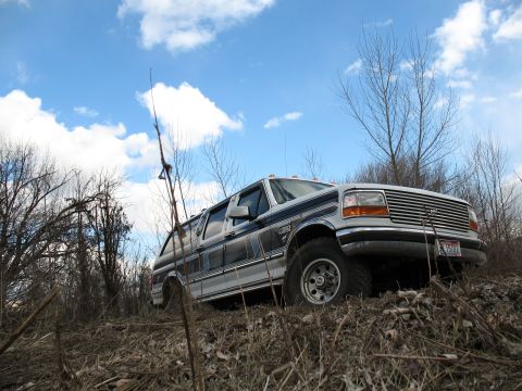 1994 Ford C-350 (Centurion Conversions) - This extended cab pickup truck appears to be from the early to mid-1990s, with a distinctive grille.