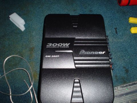 1984 Ford Bronco - Pioneer GM-320T amplifier, a car audio component, is shown on a carpeted surface.