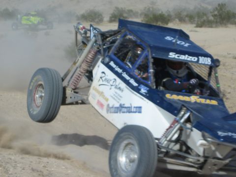 Blue Scalzo 1018 Goodyear race buggy with front wheels in the air