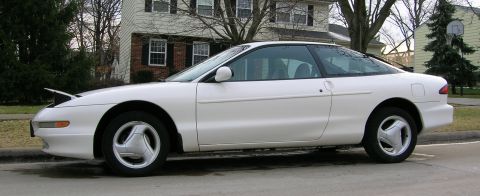 1997 Ford Probe - Side view of a white 1997 Ford Probe coupe.
