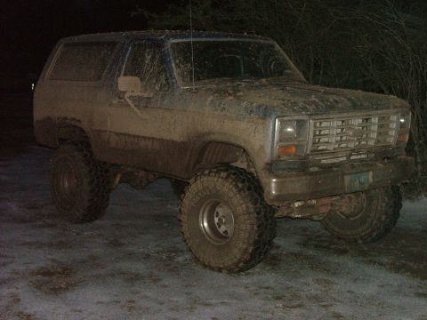 1985 Ford Bronco - 1985 Ford Bronco covered in mud after off-roading.
