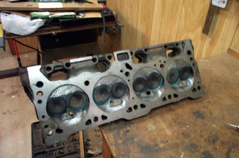 1978 Dodge Power Ram - Close-up of an engine cylinder head, showing the intake and exhaust valve ports.
