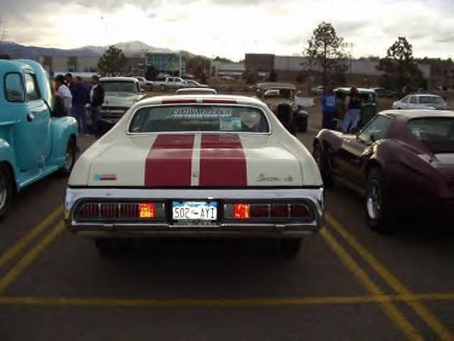 1972 Ford Ranchero rear view, white with red stripes, blue license plate