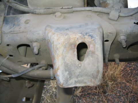 1979 Ford F-150 - Detail of a heavily used truck frame bracket, showing signs of wear and corrosion.