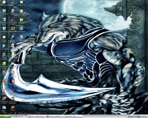 1994 Ford Thunderbird - Desktop wallpaper features a werewolf character with a large weapon against a moonlit backdrop.