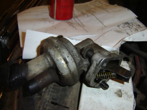 1992 Ford Bronco - A close-up view of a used fuel pump, showing its internal components and signs of wear.