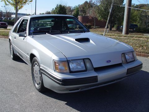 1986 Ford Mustang - This 1986 Ford Mustang hatchback is shown from a three-quarter front view.