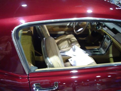 1984 Ford Bronco - Interior view of a classic car shows tan upholstery and dashboard details.