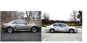 1998 Ford Taurus - A gray coupe and a silver sedan are parked next to each other outdoors.