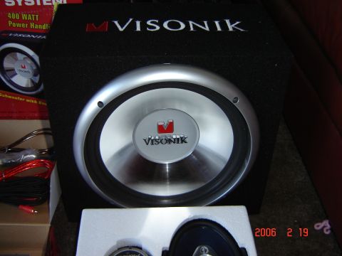 1993 Ford Bronco - Car audio components, including a Visonik subwoofer and a separate speaker, are shown in this close-up shot.