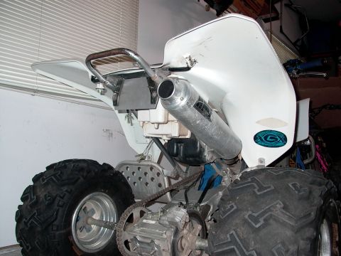 2003 Suzuki LTZ400 - Rear view of a quad bike showing its exhaust and tires.