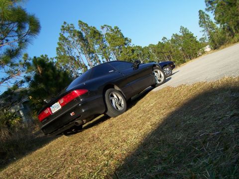 1994 Ford Probe - 1994 Ford Probe seen from the rear 3/4 angle on a sunny day.