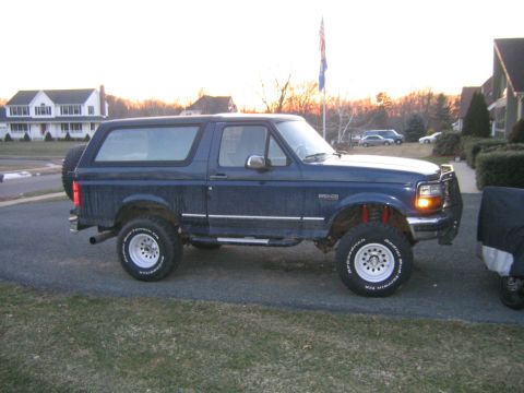 1994 Ford Bronco - This 1994 Ford Bronco is shown from the side with a spare tire mounted on the rear.