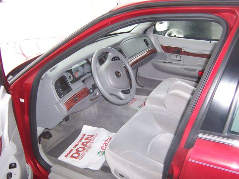 2001 Mercury Grand Marquis - Purchased from a Chevy dealer! (Note the "courtesy mat" on the floor.)