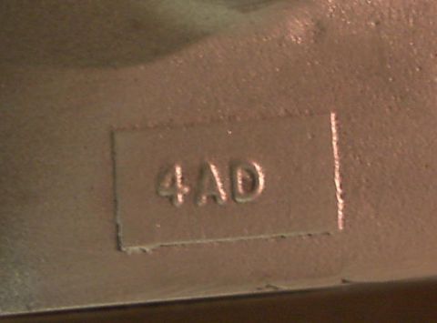 1964 Ford Fairlane - Close-up of an engine component showing the casting numbers 4AD.