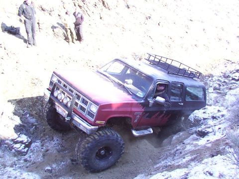 1978 Ford Bronco - This modified SUV navigates a challenging off-road course, its capabilities.