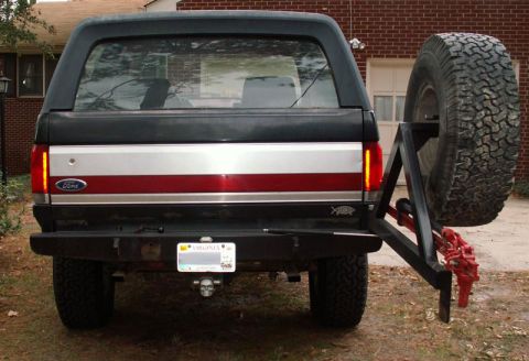 1988 Ford Bronco - Rear view of a 1988 Ford Bronco, a spare tire carrier and a custom bumper.