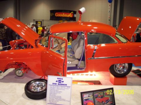 1979 Ford Bronco - A 1955 Chevrolet 210 Sedan is displayed with its hood and doors open, its interior and engine bay.