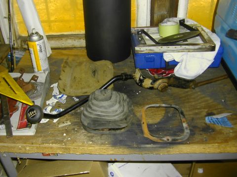 1993 Ford Bronco - Transfer case shifter boot and lever assembly, likely for a 4x4 vehicle, with a visible "4x4" shift knob.